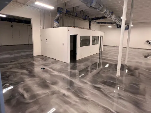 Open commercial space, metallic epoxy floor
